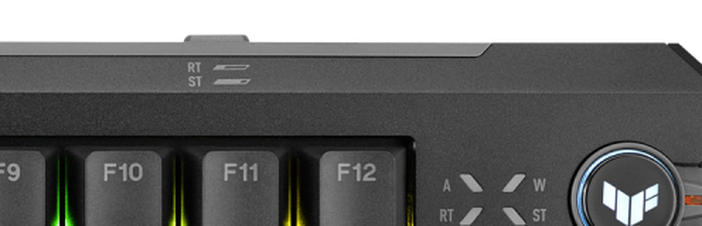 TUF Gaming K4 Magnetic の上面右側にあるRT・STのインジケーターと、A/W・RT/STの刻印、TUFロゴのボリュームノブを写した公式製品画像の拡大