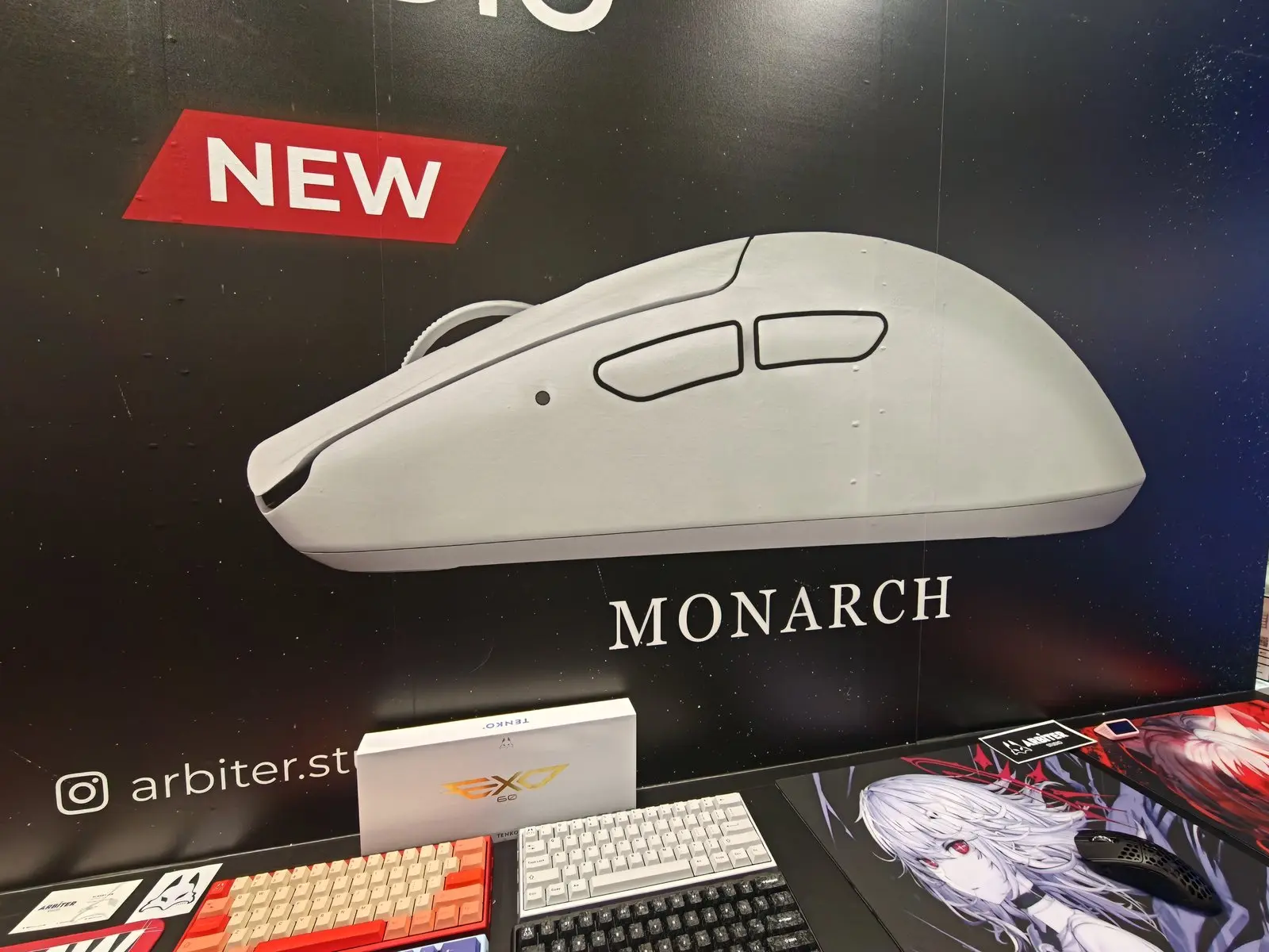 TGS2026のArbiter Studioブース。壁に「MONARCH NEW」と白いマウスの大判ビジュアル